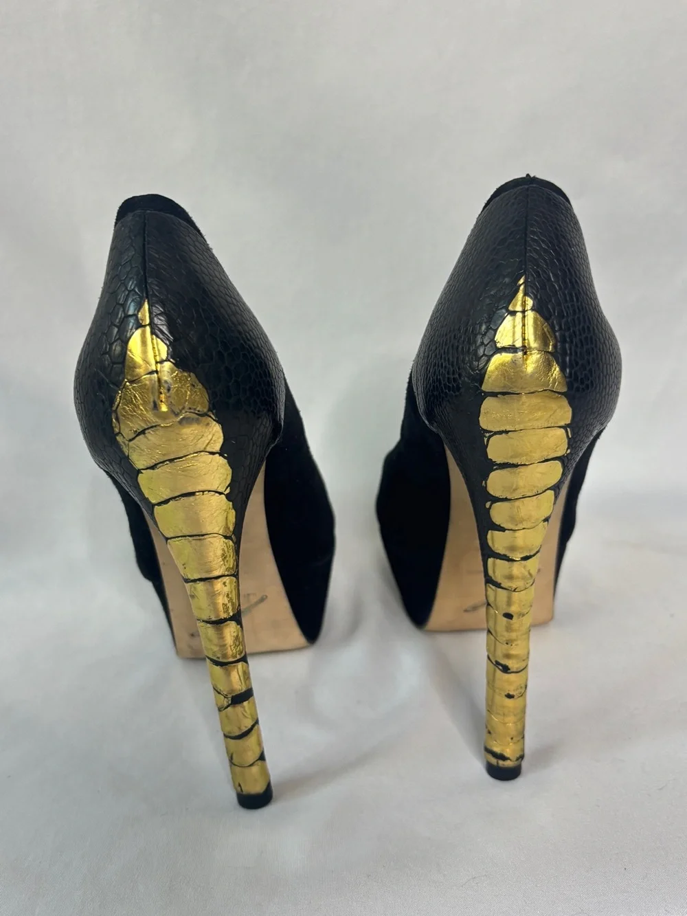 Brian Atwood suede‎ platform stiletto heels with black and gold statement detail